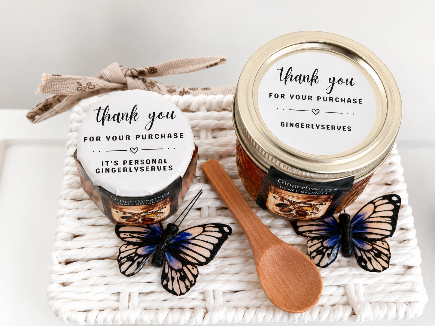 Tammy's hands tying a ribbon on a honey jar